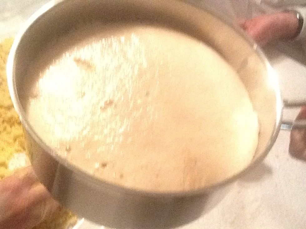 When the yeast looks like this you can pour it over the flour and butter.