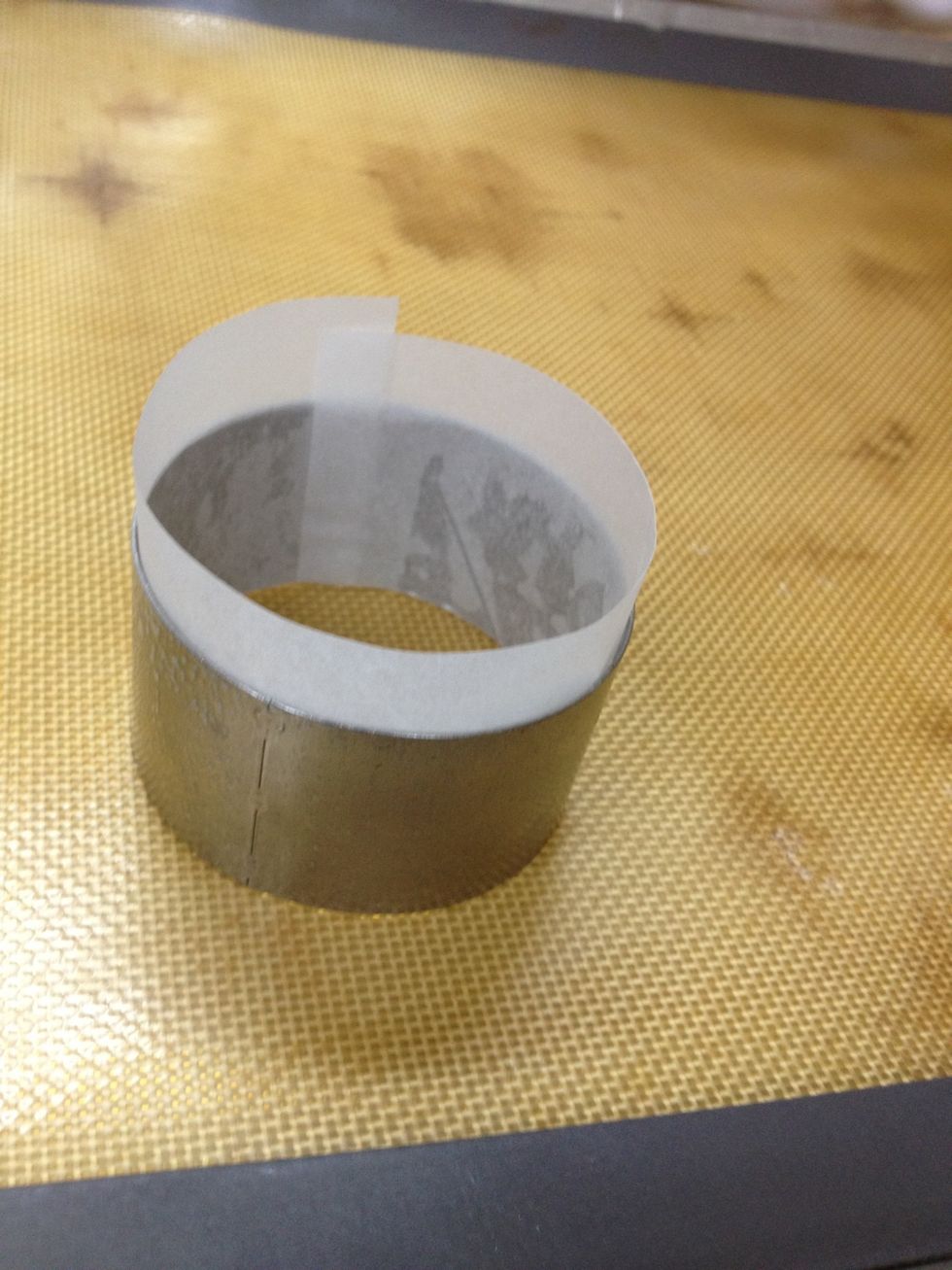 When there is 15 mins left for the batter to chill, preheat your oven to 180\u00b0C/350\u00b0F. You could use any ramekin or mould that you want. I used a greased ring mould and lined it with parchment paper.