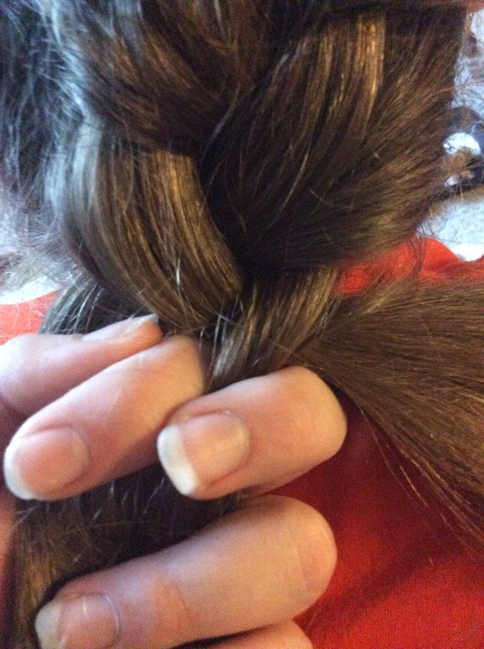 When there's no more hair to pick up just continue to braid normally