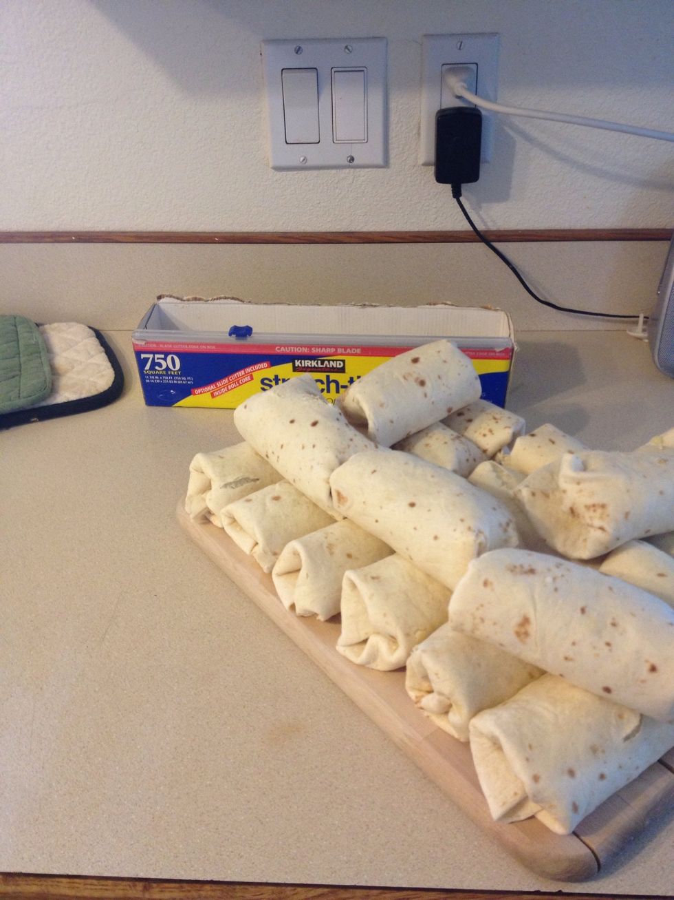 When they are all rolled up its time to wrap up. Lol. Use cling wrap.