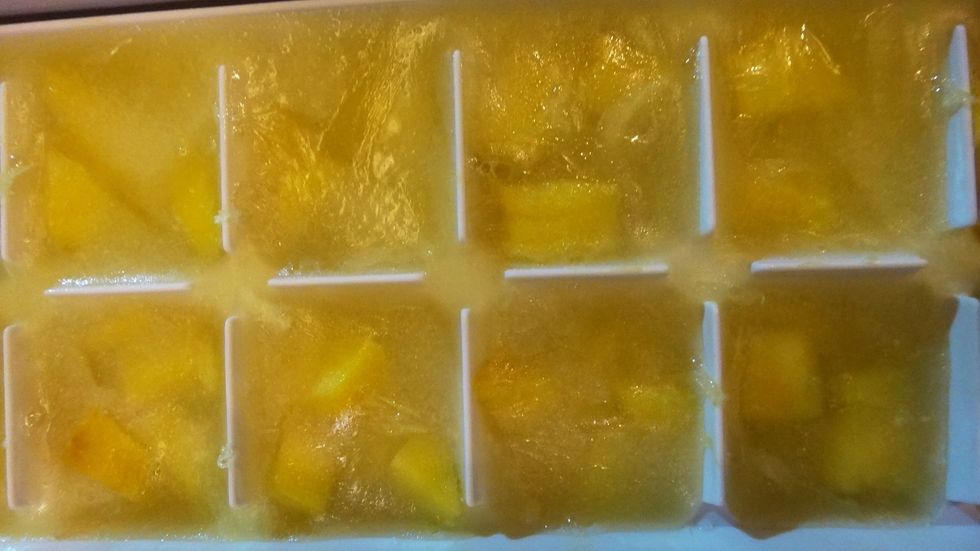 When they are ready, take them out. You may need to hit the bottom of the tray or run warm water along the underside of the tray to help get them out.