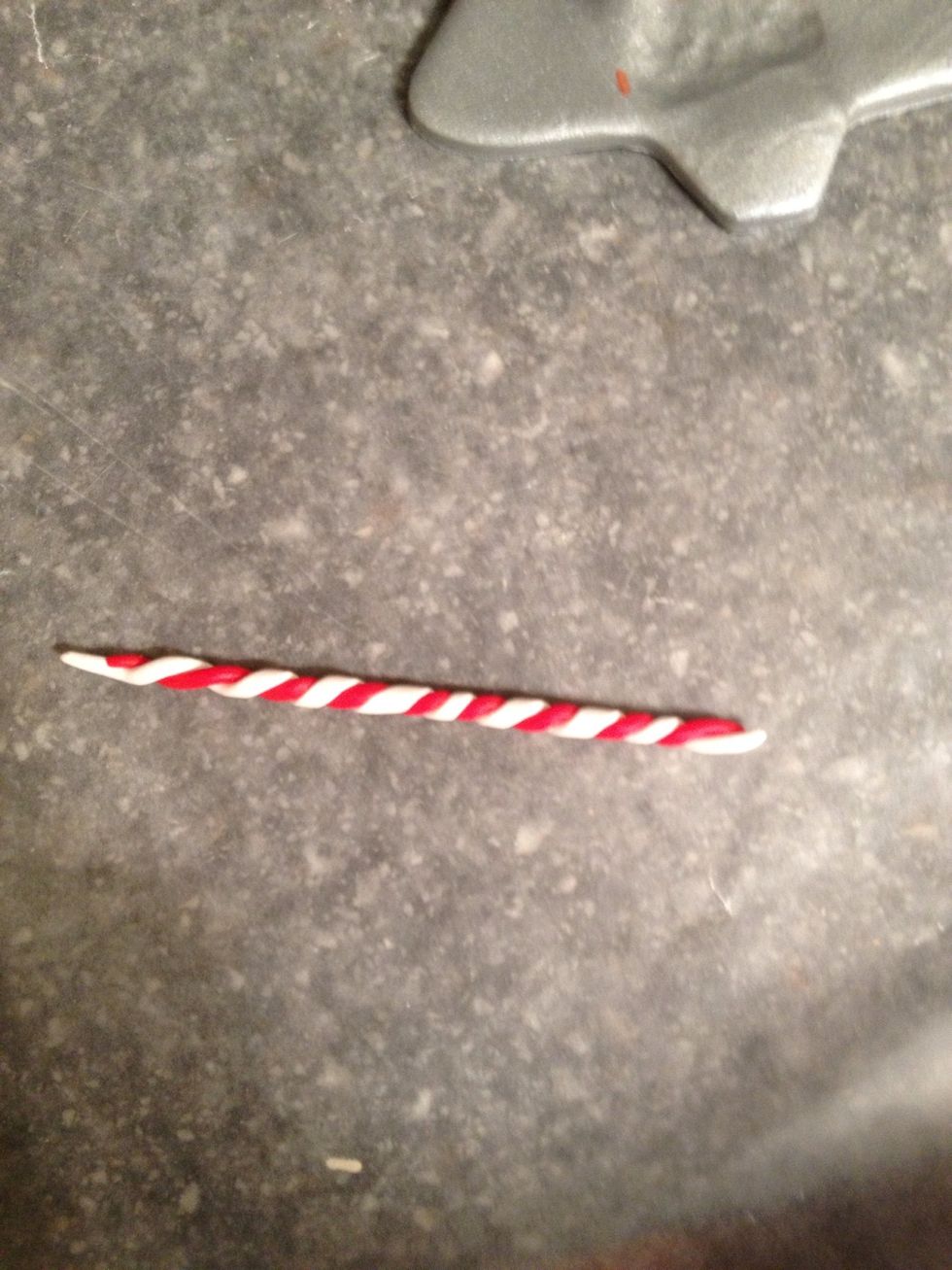 When they are wrapped together, pick the two ends up and twist them in opposite directions to create a tighter look.