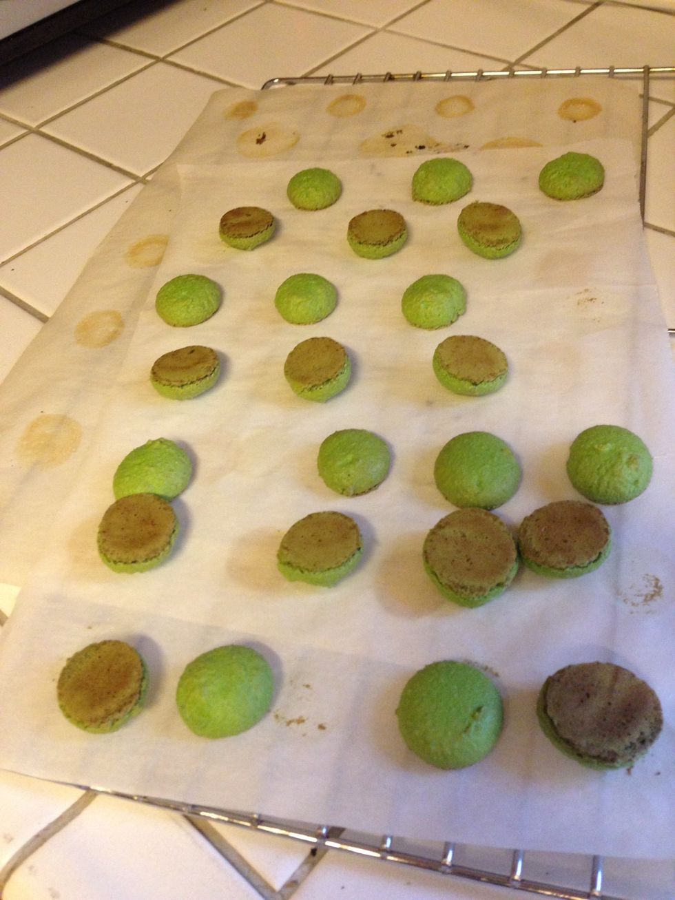 When they come out of the oven, let cool. Then flip half of them over