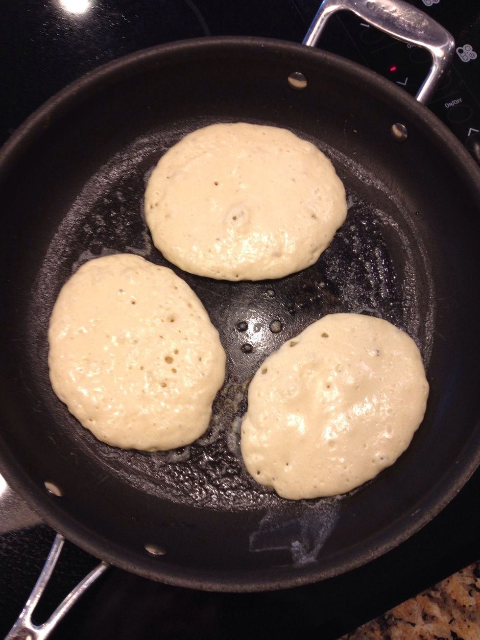 When they get firmer and bubbles..flip them