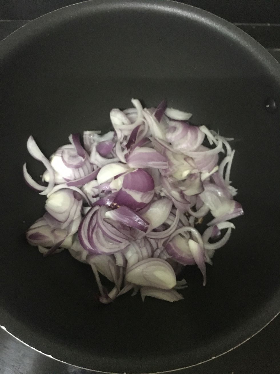 When they pop out, add the onions
