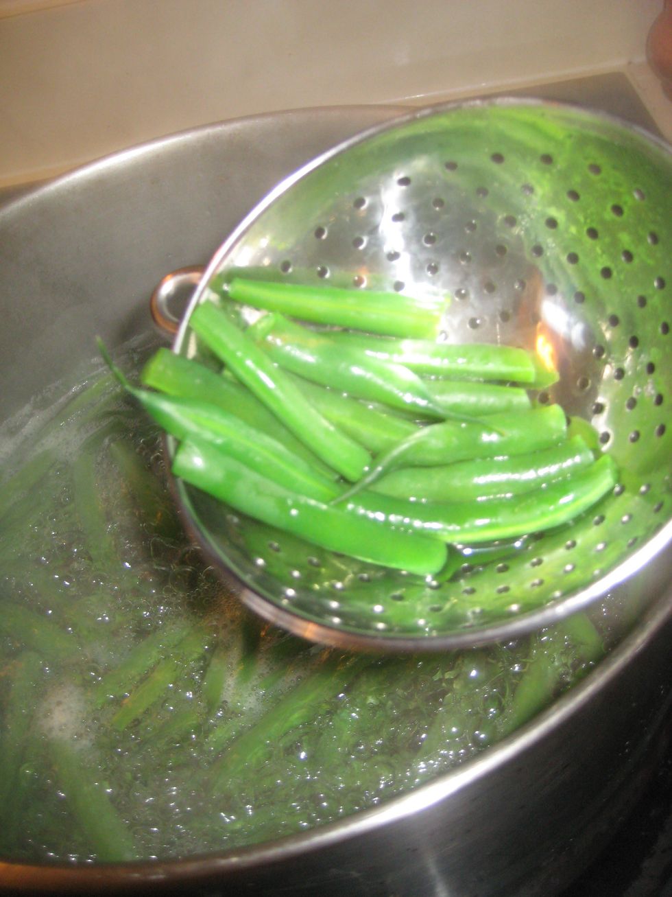 When timer rings, immediately remove with strainer.