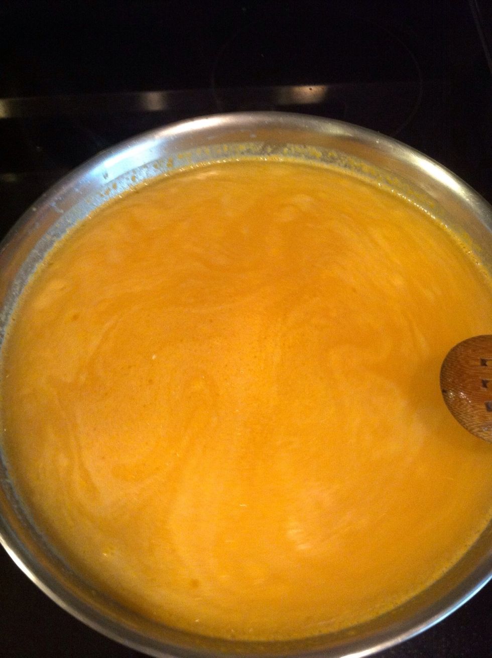 When toasted add blended tomato mixture and rest of chicken stock/water .