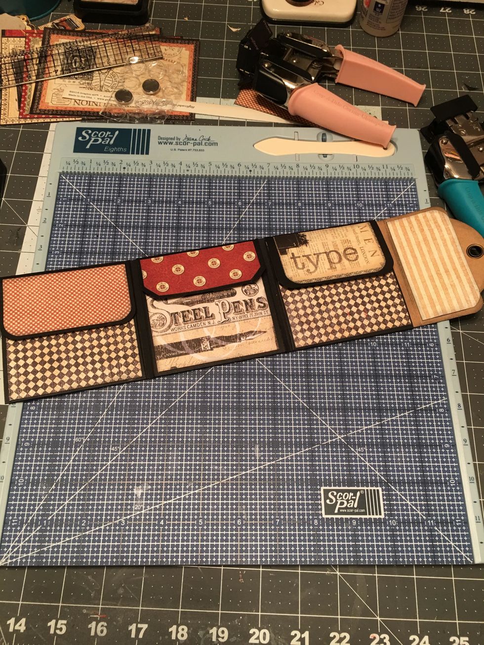 When top flaps are folded down over bottom flaps, your album should look like this.