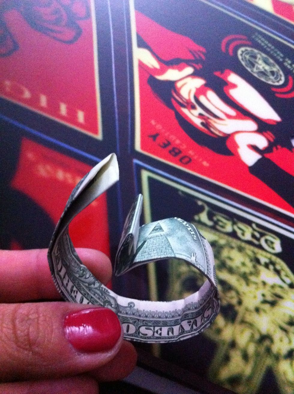 When u take it out of your finger it should make this shape.