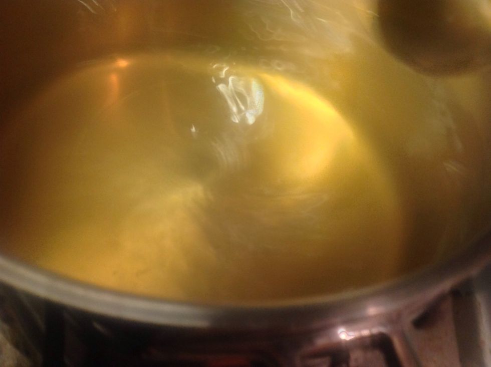 When water is boiling, make a whirlpool by turning the water.
