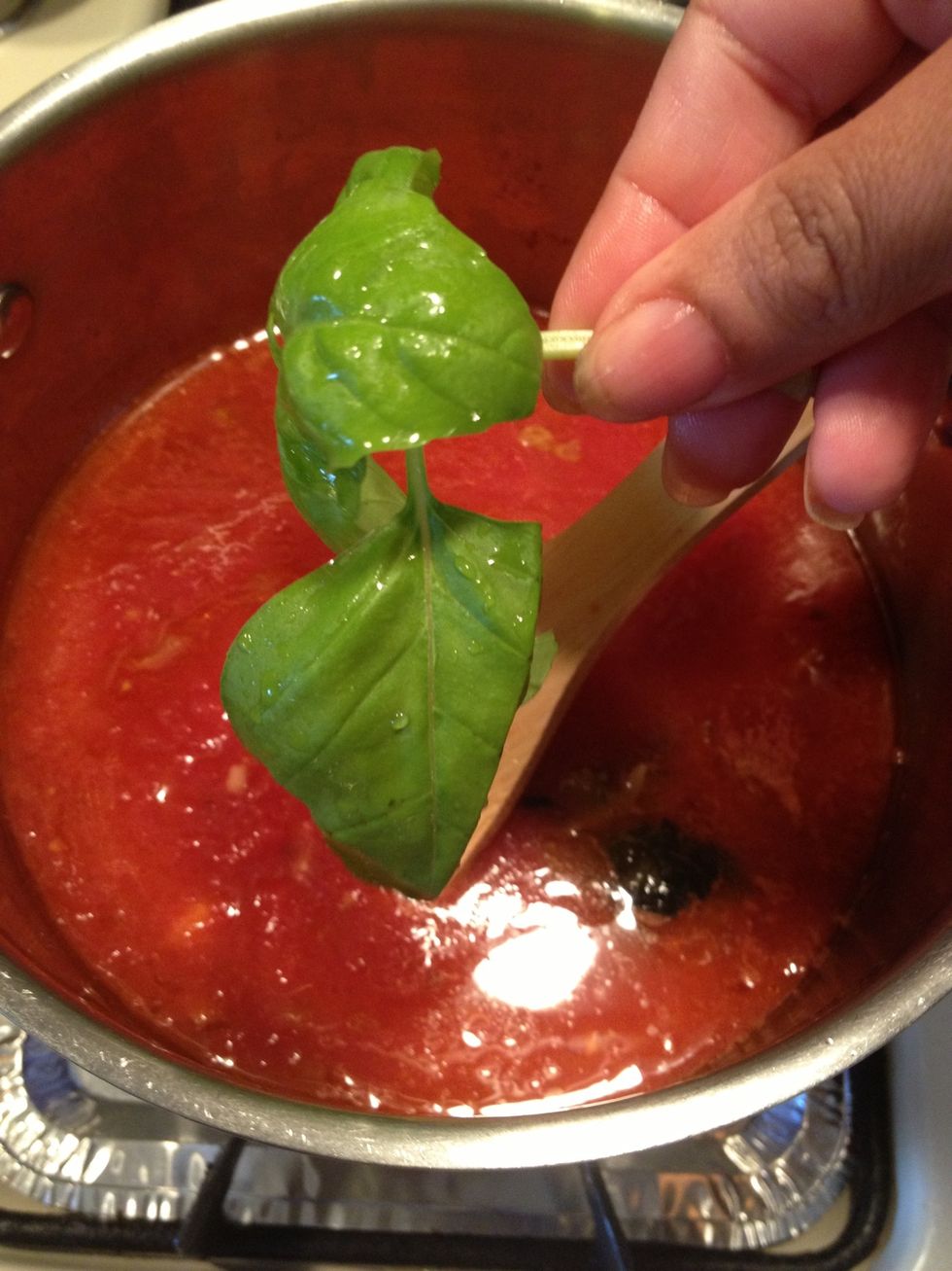 When we are almost at the end of our cooking time , which is about 30 minutes to make this sauce, we will add more basil