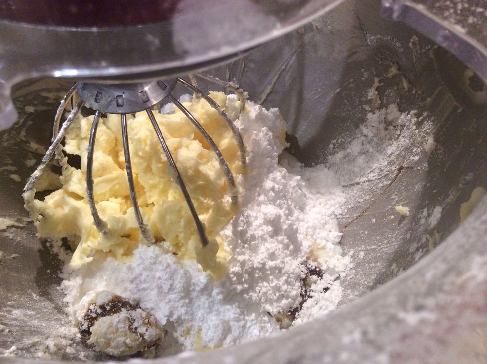When you add in the remainder of the icing sugar put in the vanilla bean paste and milk and mix until well combined (1 minute)