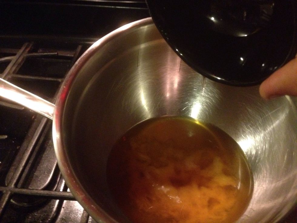 When you add the almond oil it solidifies some of the beeswax. That is normal. Just melt it all the way again before adding the butters.