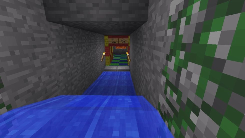 When you are at the bottom of the ladders, there is a mini water flow that takes you to the station