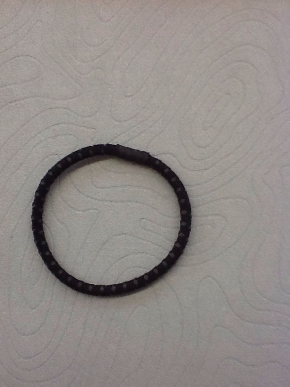 When you are at your desired stopping point take your hair tie and put it at the end