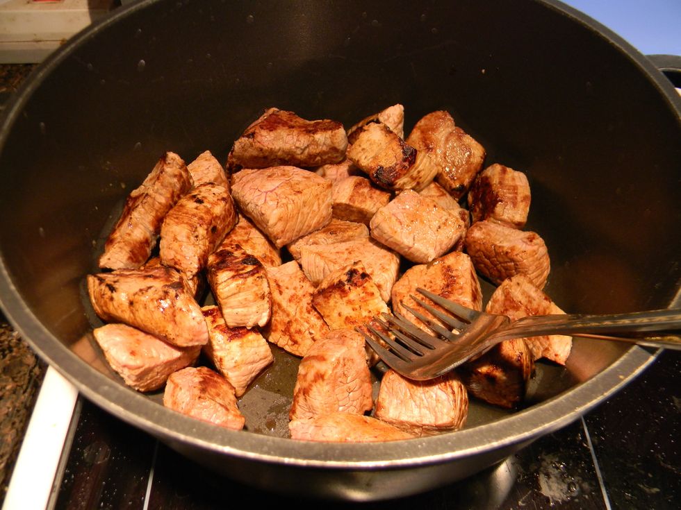 When you are done browning your meat chunks place them in a pot or dutch oven if you prefer. This will be the same dish the stew is made in later on. Don't wash the pan out yet.