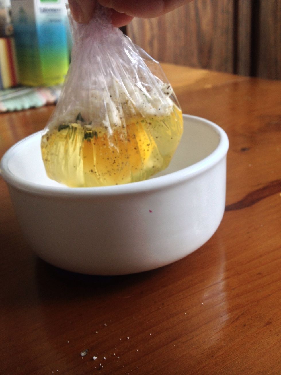 When you are done, get together the four corners of the plastic wrap