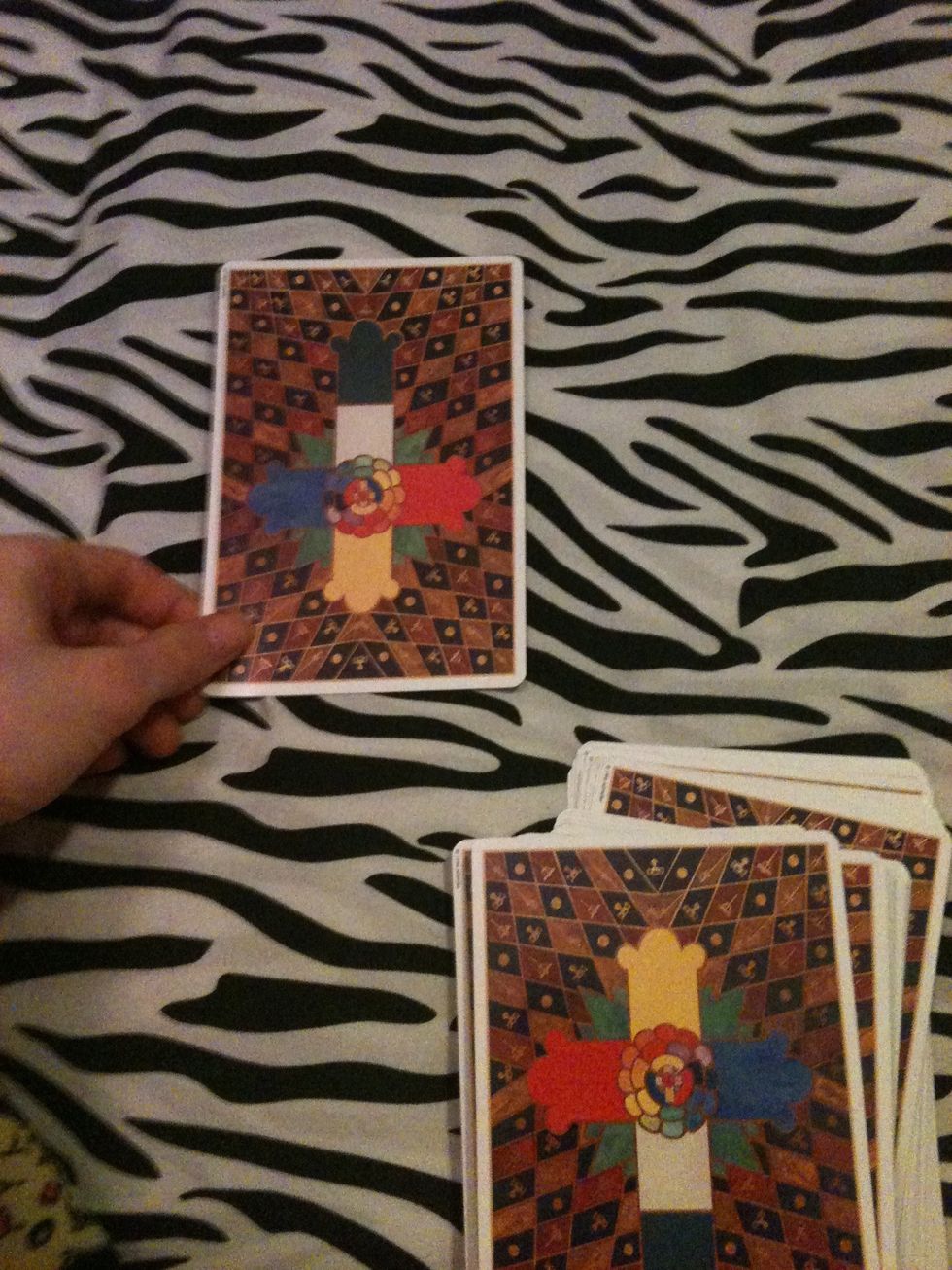 When you are done shuffling the deck, pull out the first card that speaks out to you.