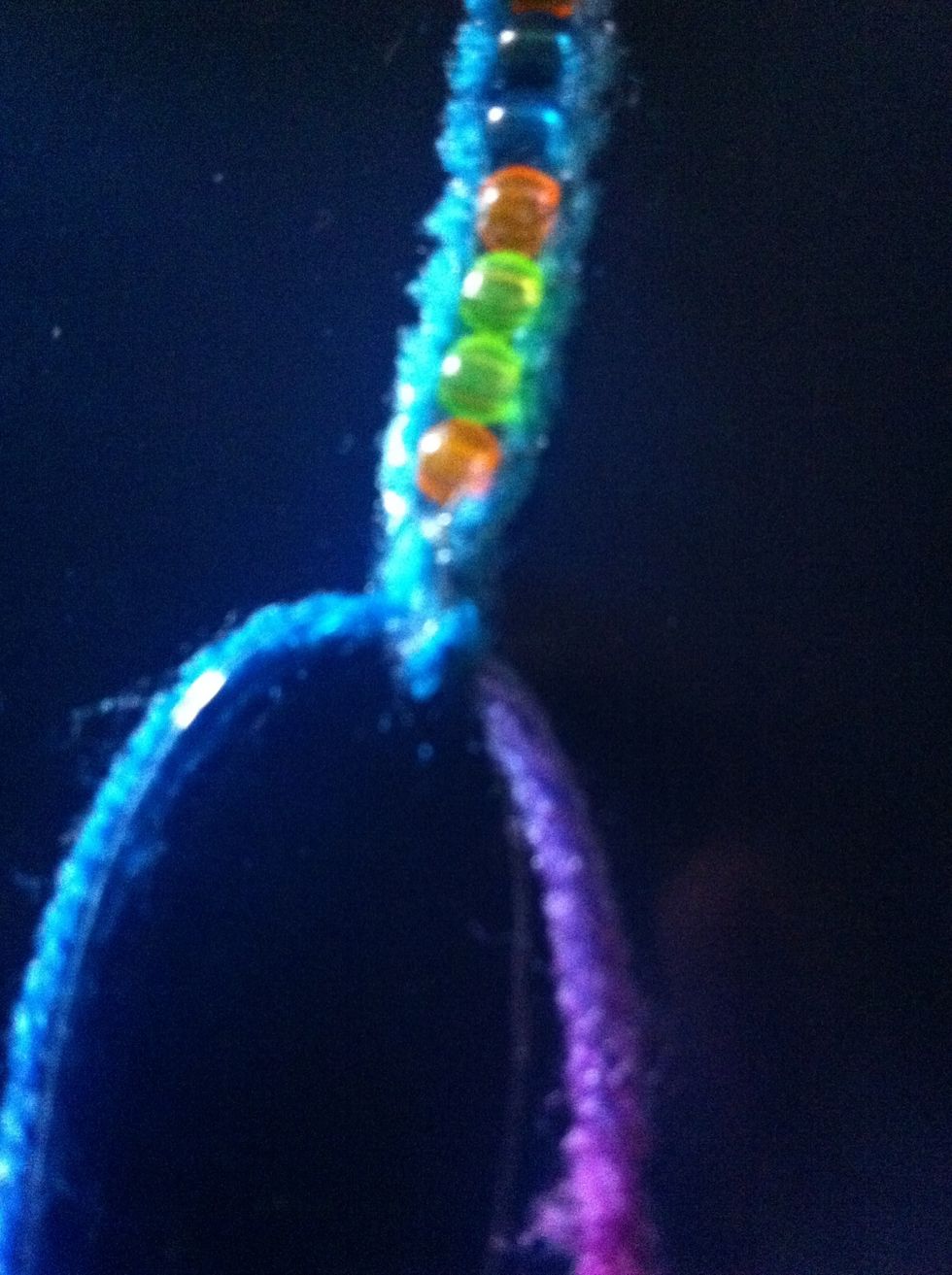 When you are done, tie many knots with the strings like I did. Then take it off the clip board.