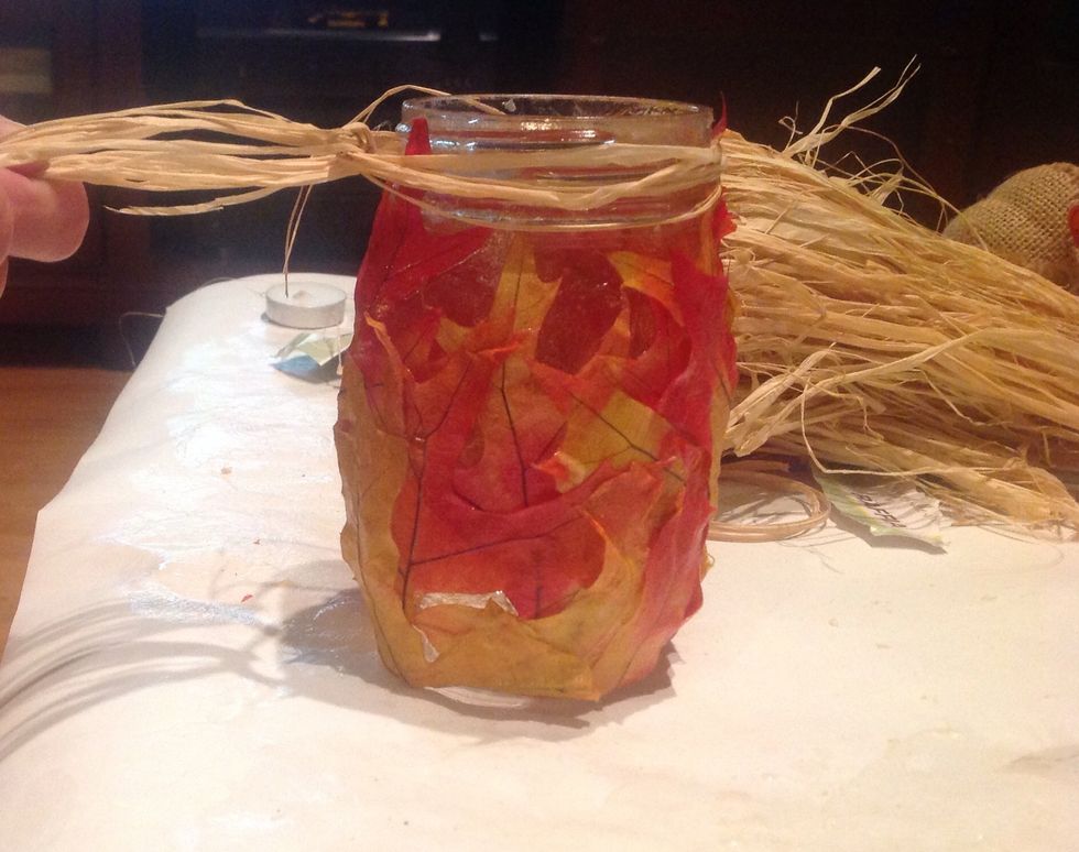 When you are finished then you will tie 3 or 4 strands of rafia to make a bow at the top of the jar.