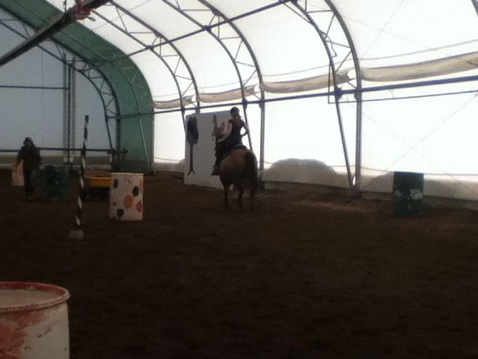 When you are posting, stand out of the saddle every other time the horses for legs make a stride. When posting your heels should be down and you lower leg should remain motionless.