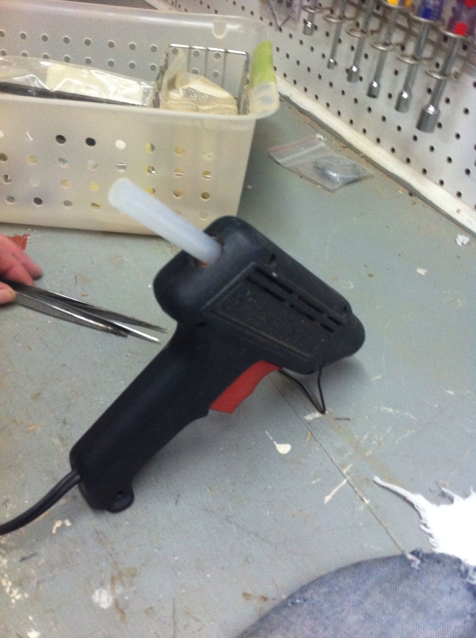 When you are ready to glue your fabric, get your hot glue gun ready. I would recommend using fabric glue that way the fabric stays on better.