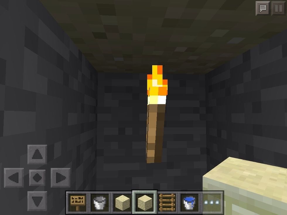 When you break this torch it should make an opening at the top