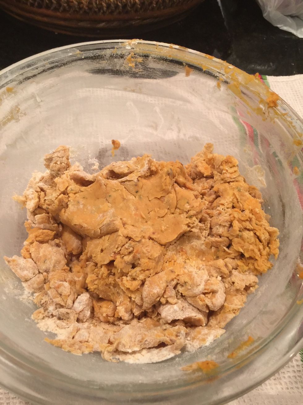 When you can pinch the dough and it holds you can knead into a ball.