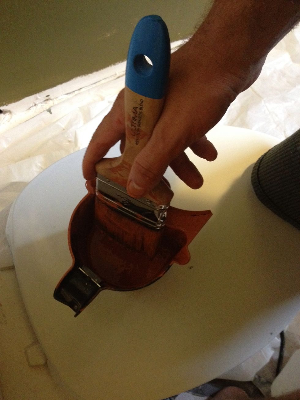 When you dip the brush, just dip the tip and run one side of the bristles against the edge of the paint bucket to strain excess paint back into the bucket. Leave the other with the excess paint on it.