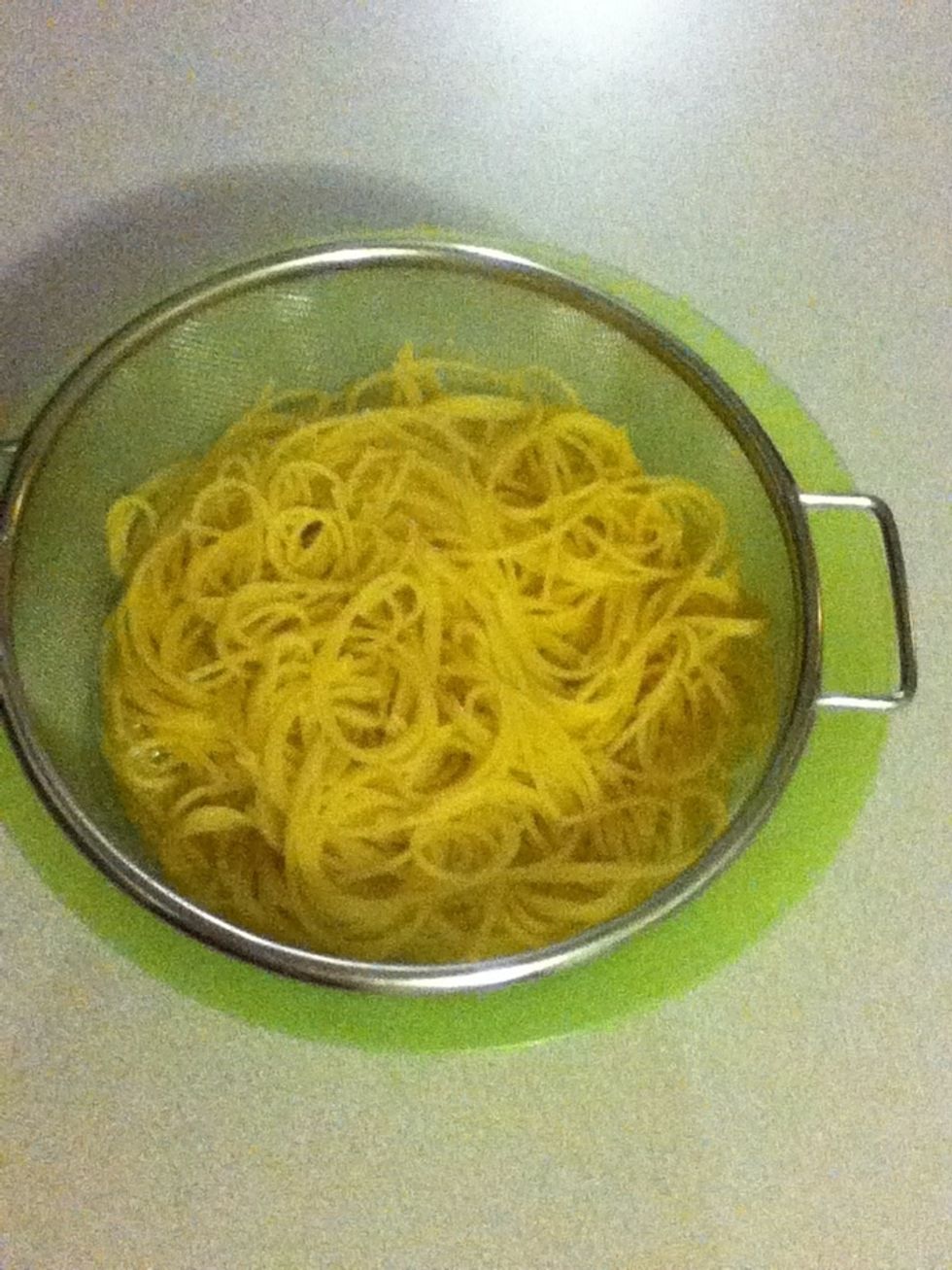 When you drain it, use an arrangement like this here so you can reserve some of that pasta water. You'll use it later, & you can keep it in the fridge for days if you wanna have pasta again this week.
