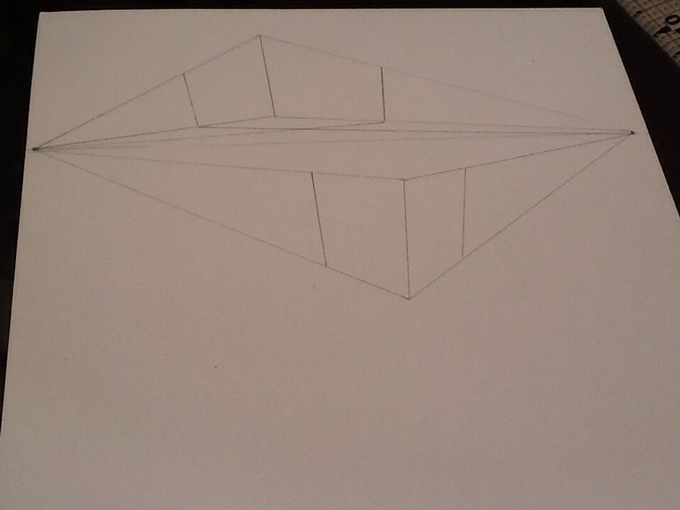 When you draw the sides, make sure you are lining you ruler up with the 3rd vanishing point.