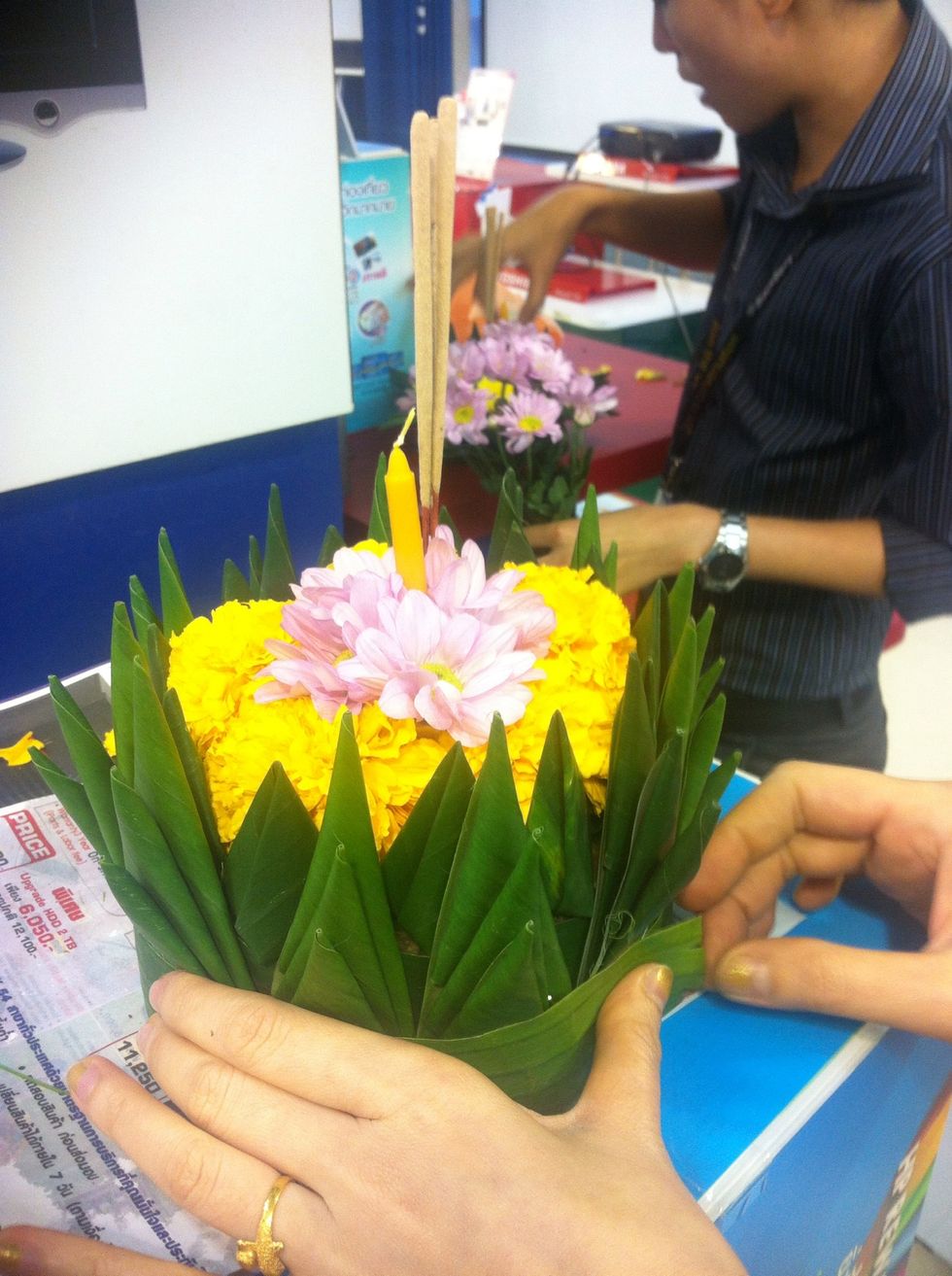 When you finish of Krathong. You will decorate with some flower, candle and incense sticks.