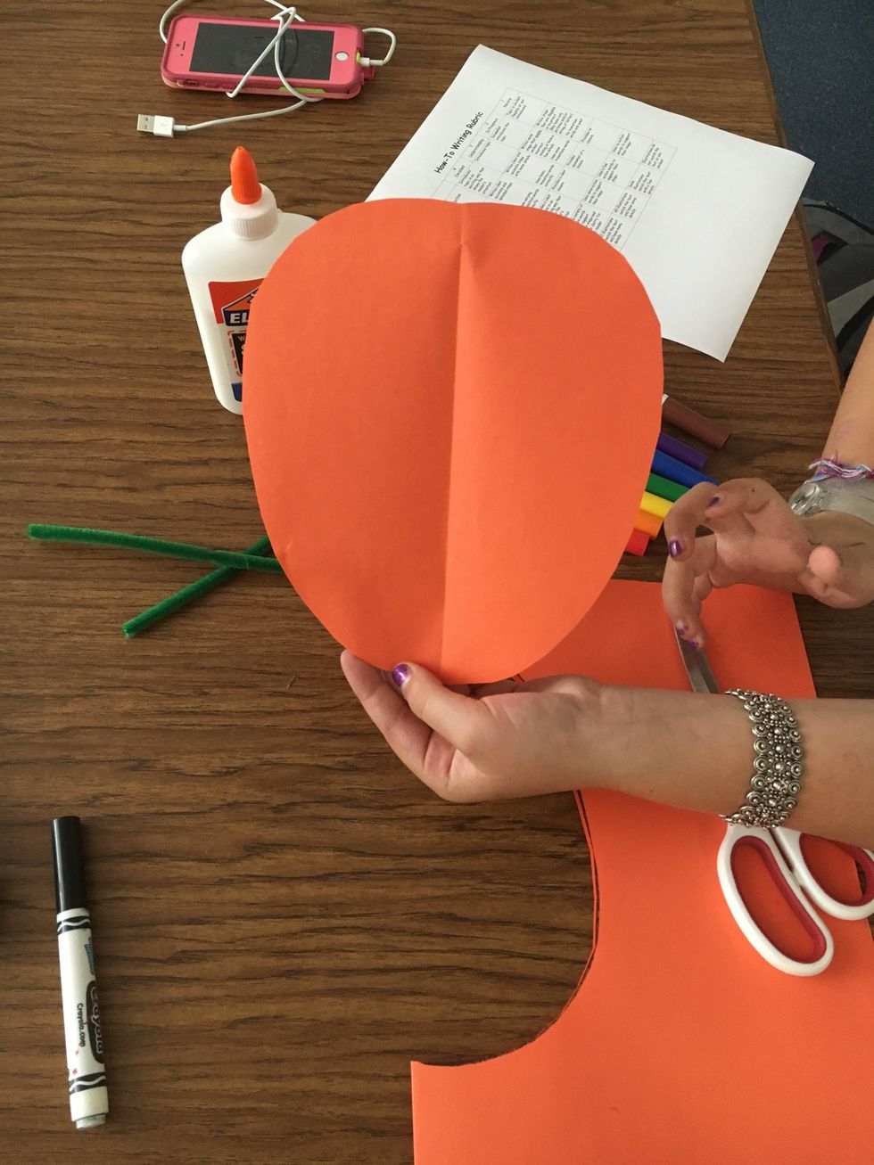 When you finished cutting the backwards "C" out, it should make a circle.