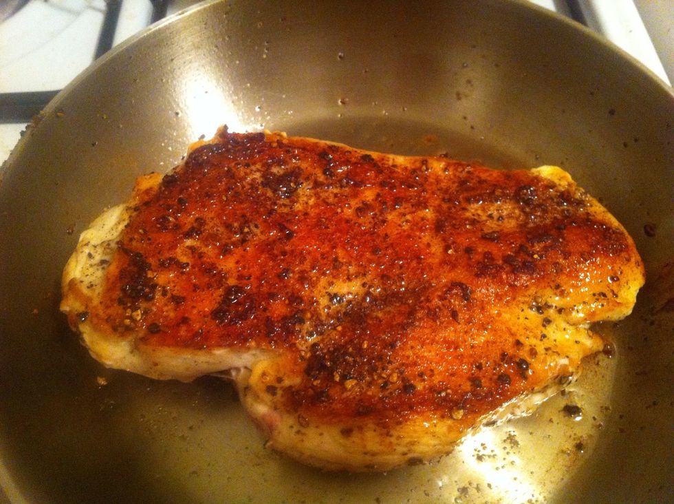 When you flip it, you'll see this beautiful sight. Your chicken should be a deep, crispy brown. Or as it's known in my house, "ridiculously awesome brown." Let it keep cooking on the other side.