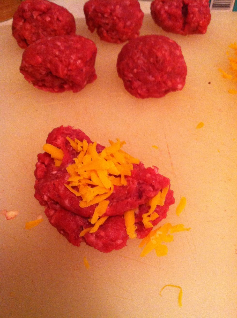 ...when you fold it in. After the first fold, add more cheese on top. Continue folding in the cheese.