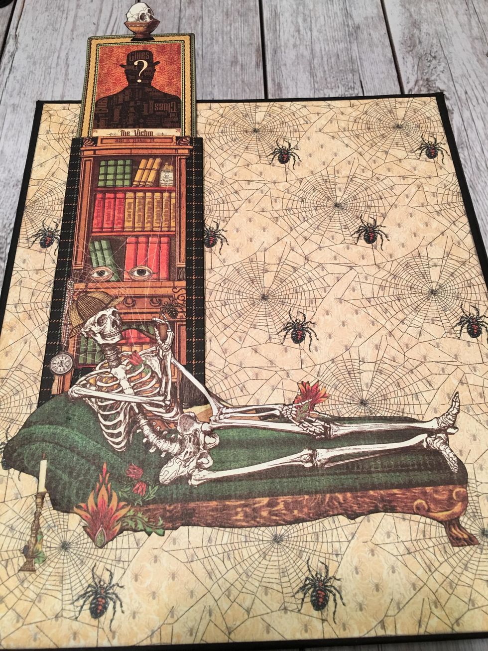 When you gently pull on the skull at the top, a picture slides out.