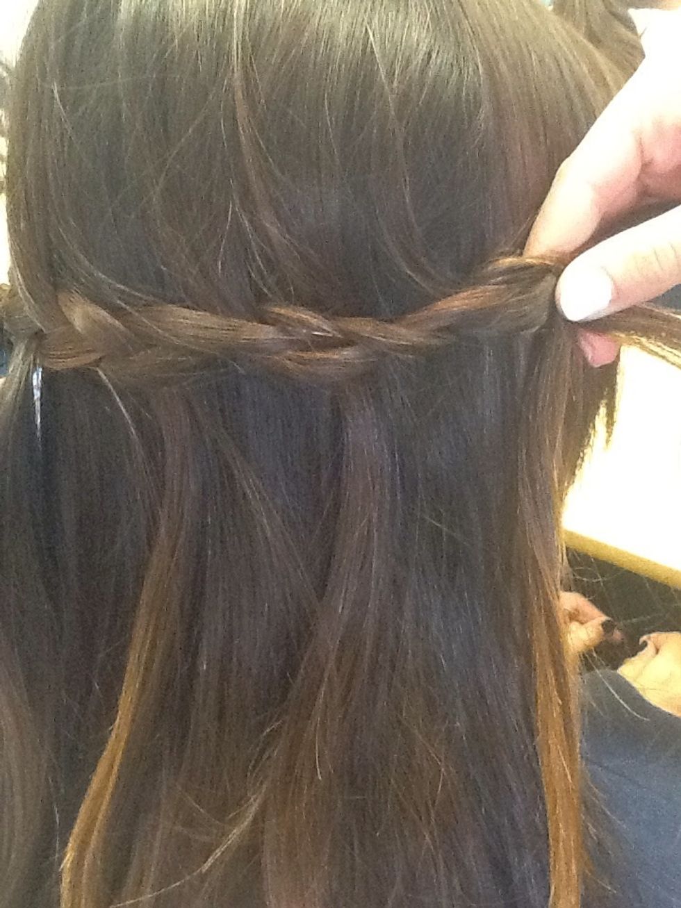 When you get almost behind your ear stop braiding.