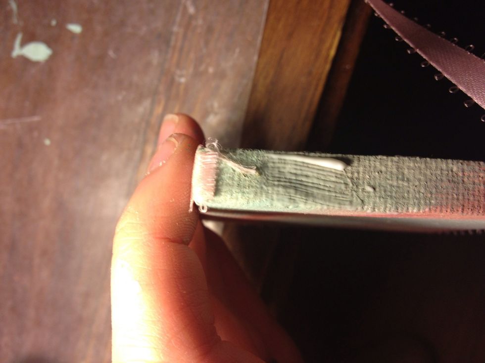 When you get back to the start corner, add some glue and tuck the beginning around the corner.