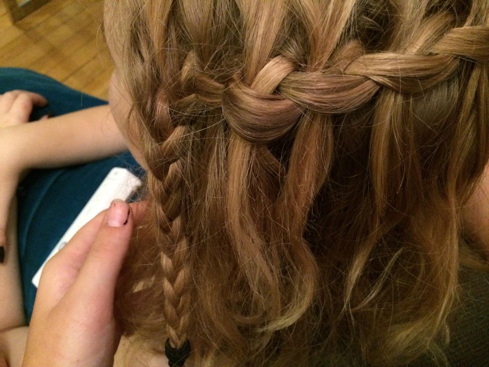 When you get to the end just braid your last three strands all the way down and tie with and elastic