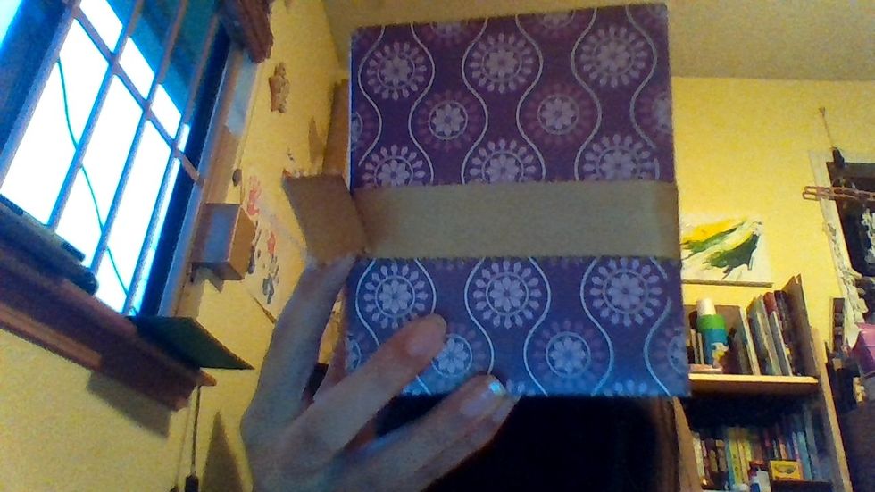 When you get to the end, put another piece of adhesive and stick the rest of the ribbon on there.You can cover it up with a bow, or you can just leave it as it is.