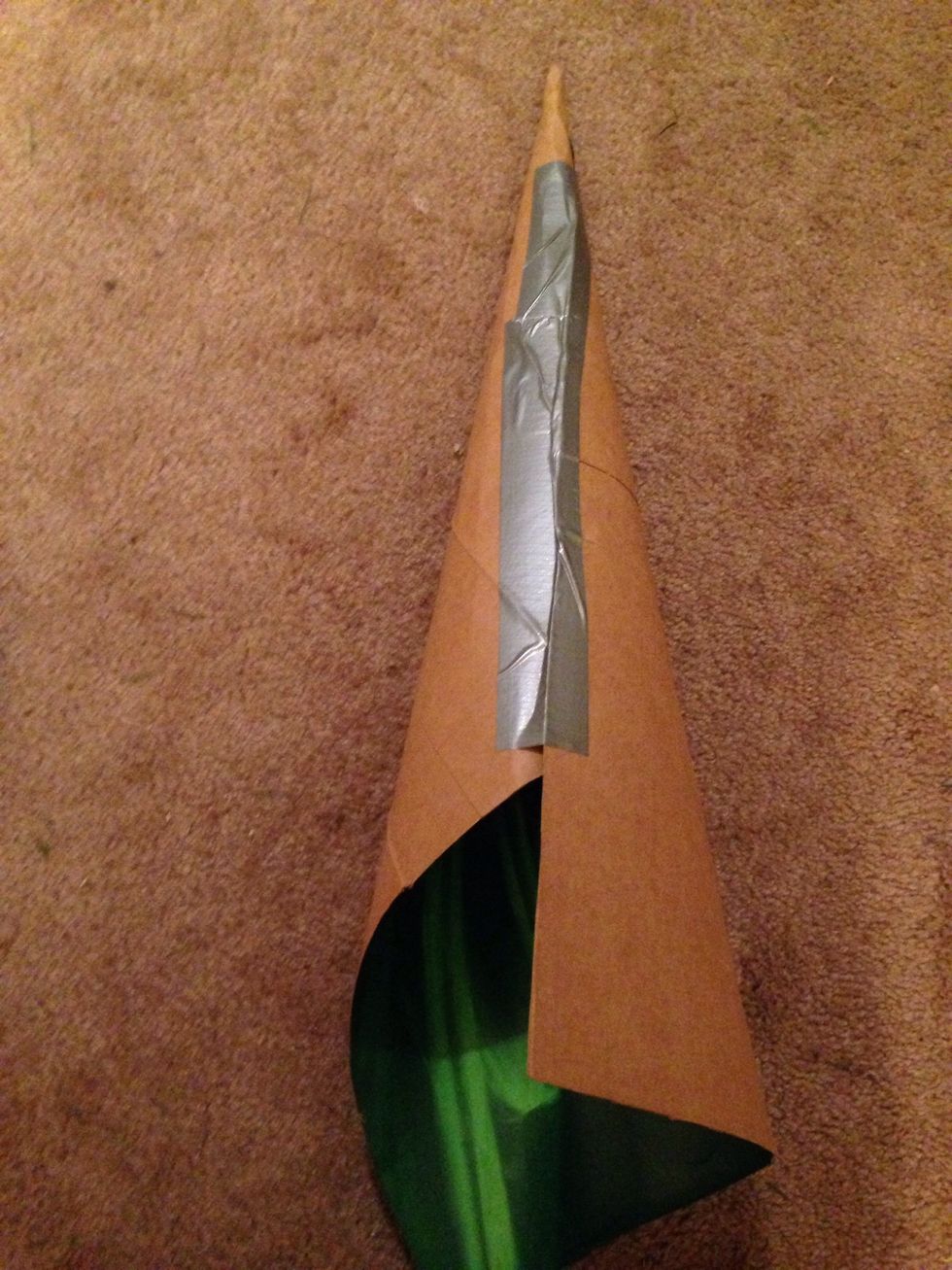 When you have a circumference to your liking tape the cardboard together