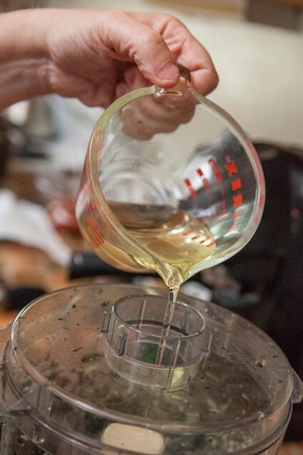 When you have a rough paste add in the oil. You'll have to eyeball this to get the right proportion of smoothness. I added in about 1/4 cup of oil. You may want more.