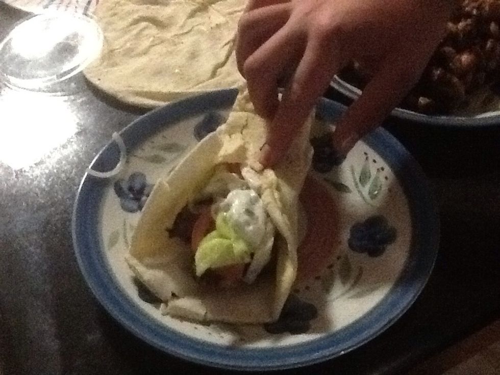 When you have added you toppings you just wrap it up and then you enjoy. The amount that this recipe makes is two souvlaki's.