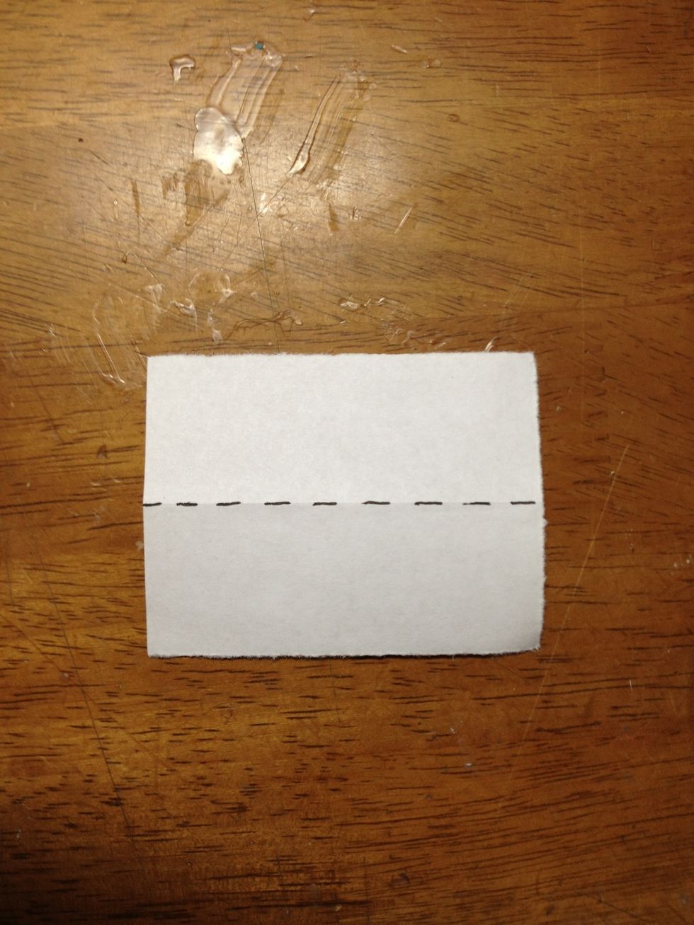 When you have all your pieces cut out, take each individual piece and fold along the dotted line (or as some people say "the hotdog way").