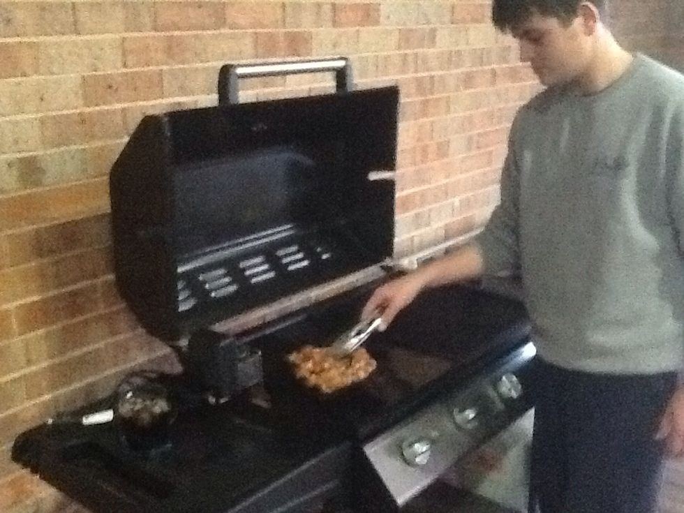 When you have finished marinating you have to cook them. You add a tablespoon of oil onto the fryer and let them cook through