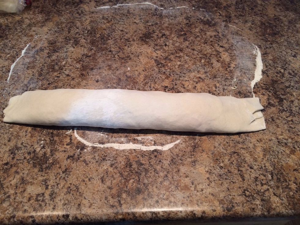 When you make the last fold, try to keep the seam on the bottom, it helps it from coming apart while cooking. Use your fingers and tuck the ends underneath and "seal" the ends.