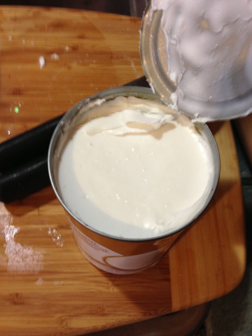 When you open a can of coconut milk sometimes the top has congealed. Just scoop the whole thing into the pan.