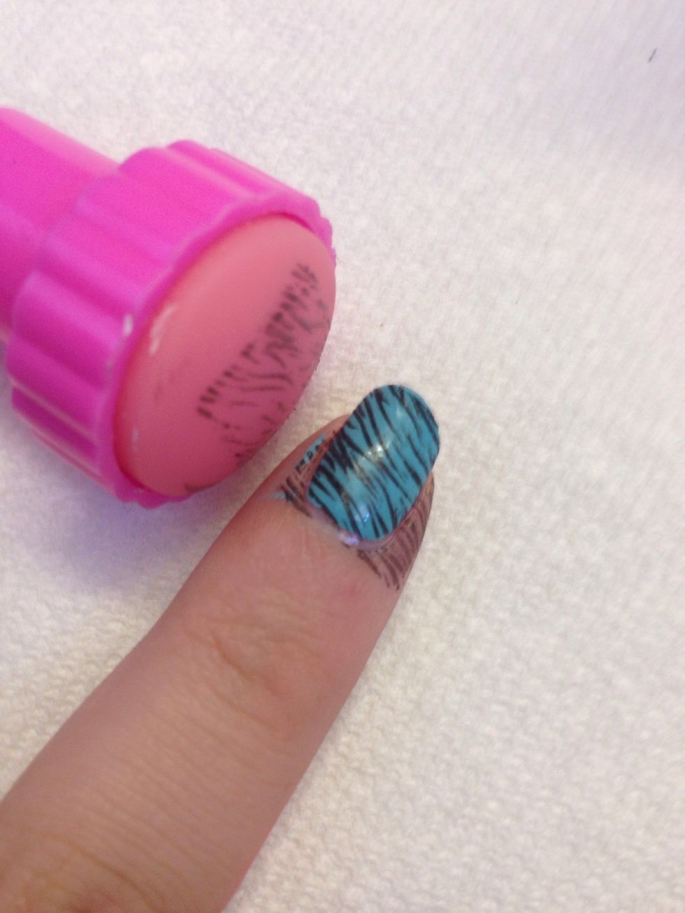 When you press the stamp onto the plate to pick up the design, press flat and fast. When you're putting it on your nail, ROLL the stamp over the nail slowly. Start from one side of the nail then roll.