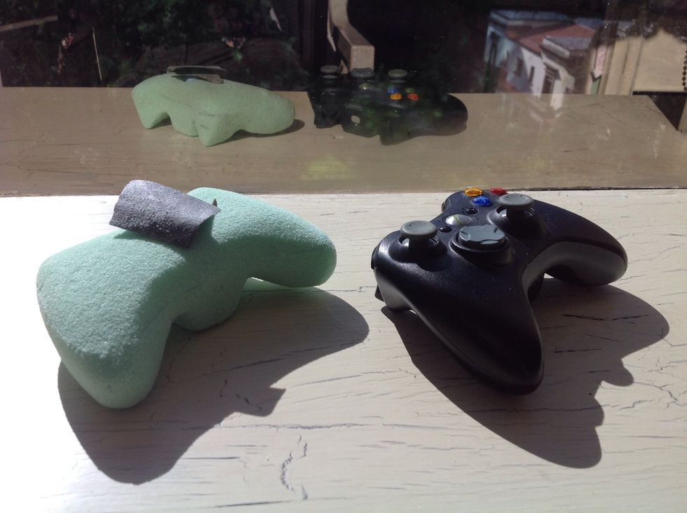 When you're done sanding, your controller will look similar to this one. Use the original controller as a guide for all proportions