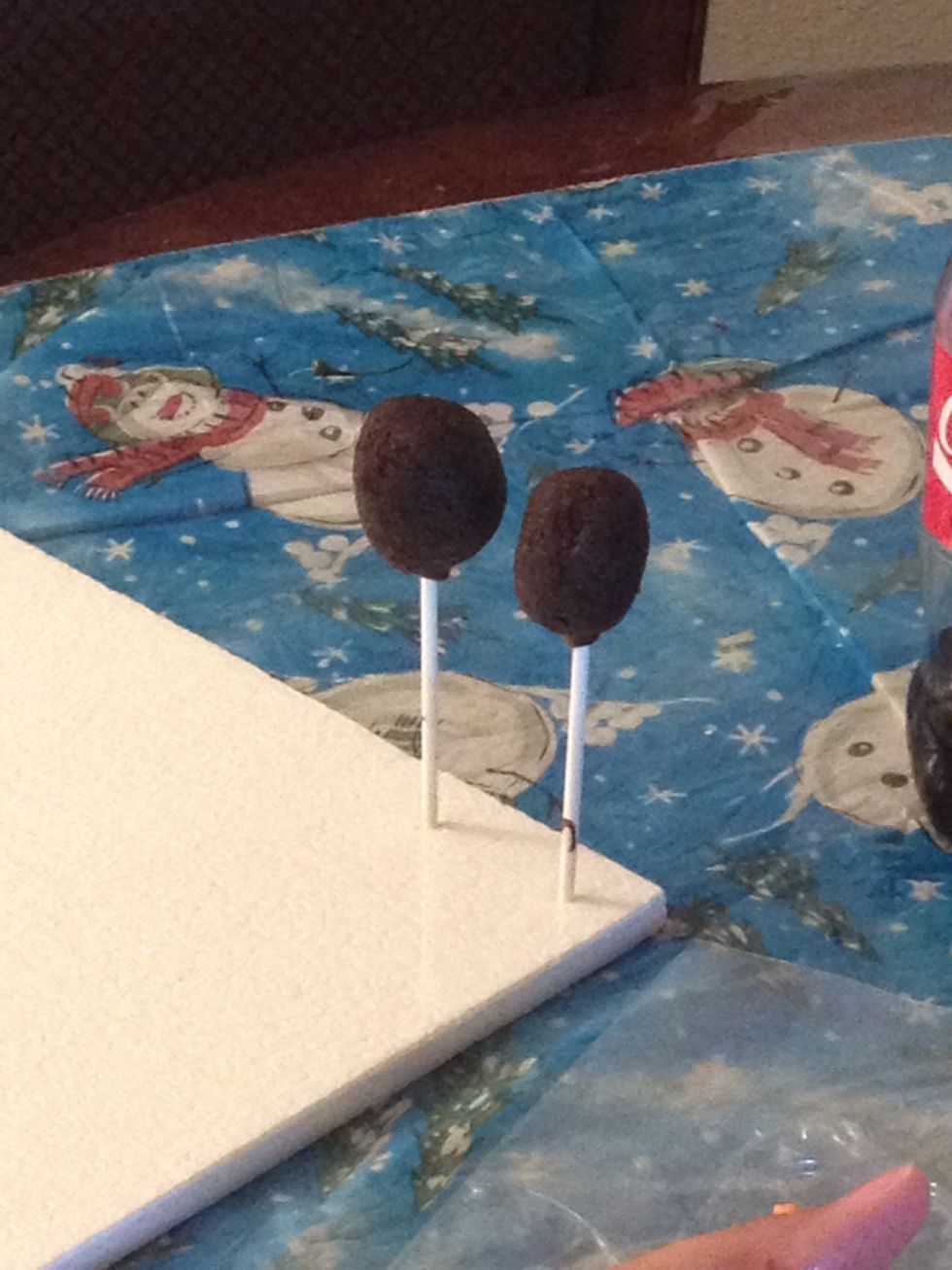 When you're ready to dip, remove a few cake balls at a time from the refrigerator, keeping the rest chilled.